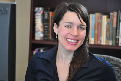 Michelle smiling at desk